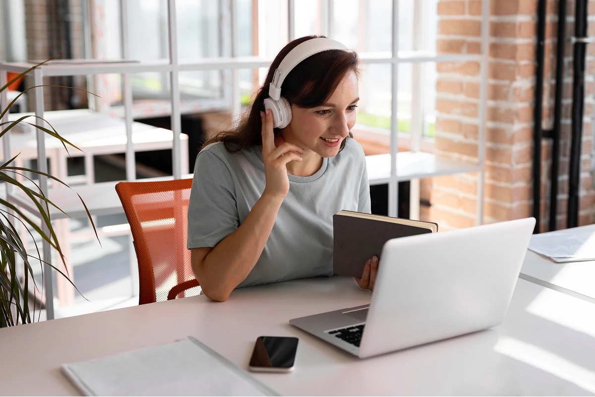 woman-working-with-headphones-medium-shot 1 (1)